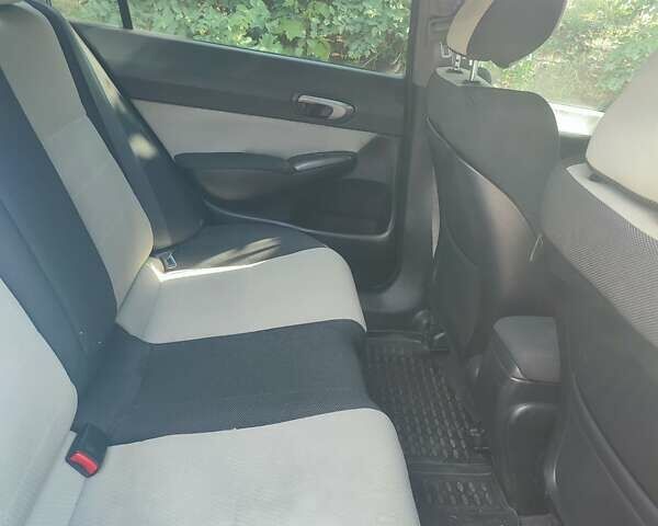 Синий Хонда Цивик, объемом двигателя 1.8 л и пробегом 201 тыс. км за 4999 $, фото 14 на Automoto.ua