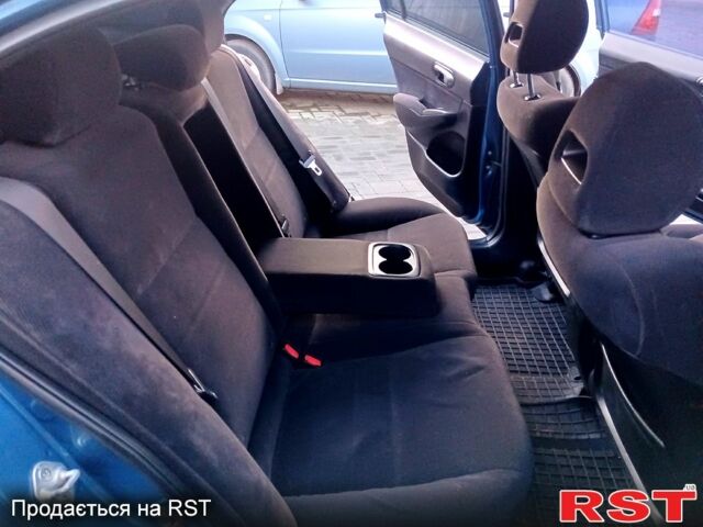 Синий Хонда Цивик, объемом двигателя 1.8 л и пробегом 207 тыс. км за 6000 $, фото 6 на Automoto.ua