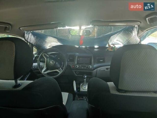 Синий Хонда Цивик, объемом двигателя 1.8 л и пробегом 201 тыс. км за 4999 $, фото 16 на Automoto.ua