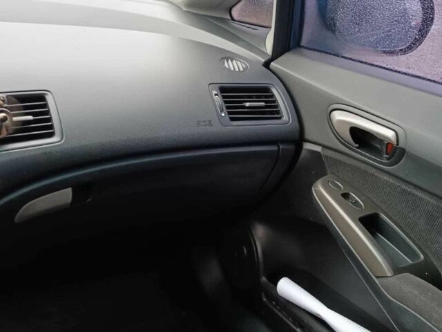 Синий Хонда Цивик, объемом двигателя 1.8 л и пробегом 238 тыс. км за 5800 $, фото 22 на Automoto.ua