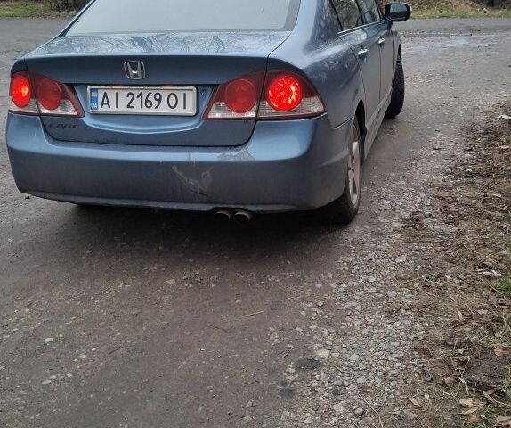 Синий Хонда Цивик, объемом двигателя 1.8 л и пробегом 313 тыс. км за 4600 $, фото 6 на Automoto.ua