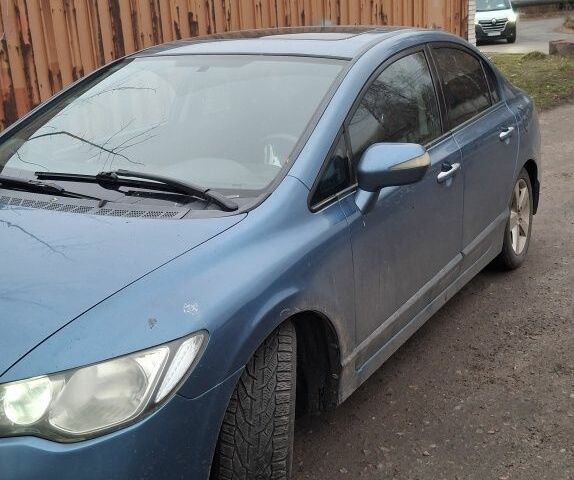 Синий Хонда Цивик, объемом двигателя 1.8 л и пробегом 313 тыс. км за 4600 $, фото 1 на Automoto.ua