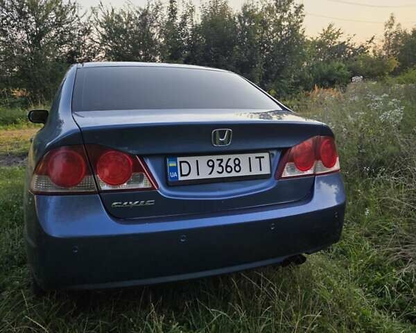 Синий Хонда Цивик, объемом двигателя 1.8 л и пробегом 235 тыс. км за 6500 $, фото 4 на Automoto.ua
