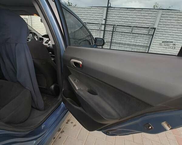 Синий Хонда Цивик, объемом двигателя 1.8 л и пробегом 219 тыс. км за 7436 $, фото 14 на Automoto.ua