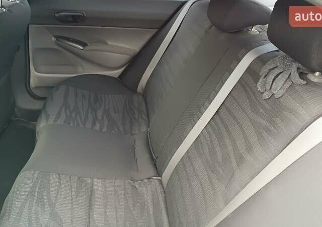 Синий Хонда Цивик, объемом двигателя 1.8 л и пробегом 218 тыс. км за 5000 $, фото 23 на Automoto.ua