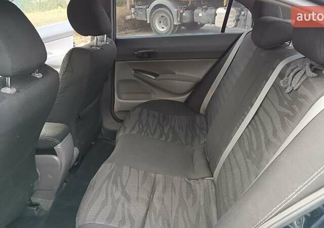 Синий Хонда Цивик, объемом двигателя 1.8 л и пробегом 218 тыс. км за 5000 $, фото 24 на Automoto.ua