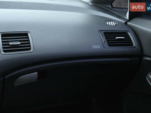 Синий Хонда Цивик, объемом двигателя 1.8 л и пробегом 244 тыс. км за 5999 $, фото 27 на Automoto.ua