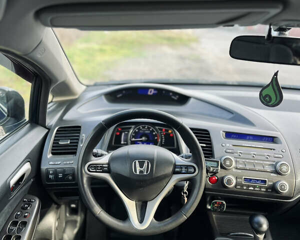 Синий Хонда Цивик, объемом двигателя 1.34 л и пробегом 191 тыс. км за 6600 $, фото 24 на Automoto.ua