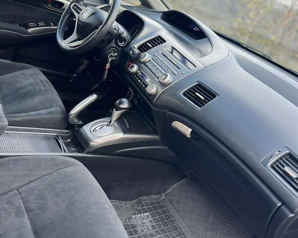 Синий Хонда Цивик, объемом двигателя 1.34 л и пробегом 191 тыс. км за 6600 $, фото 17 на Automoto.ua