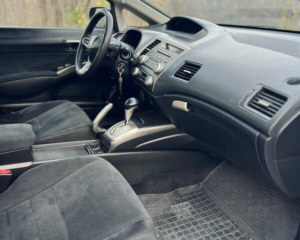 Синий Хонда Цивик, объемом двигателя 1.34 л и пробегом 191 тыс. км за 6600 $, фото 16 на Automoto.ua