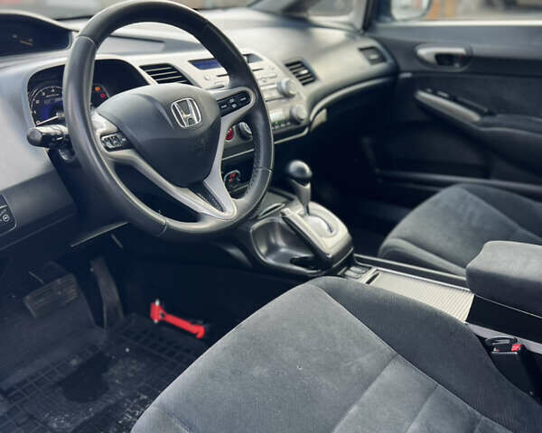 Синий Хонда Цивик, объемом двигателя 1.34 л и пробегом 191 тыс. км за 6600 $, фото 18 на Automoto.ua