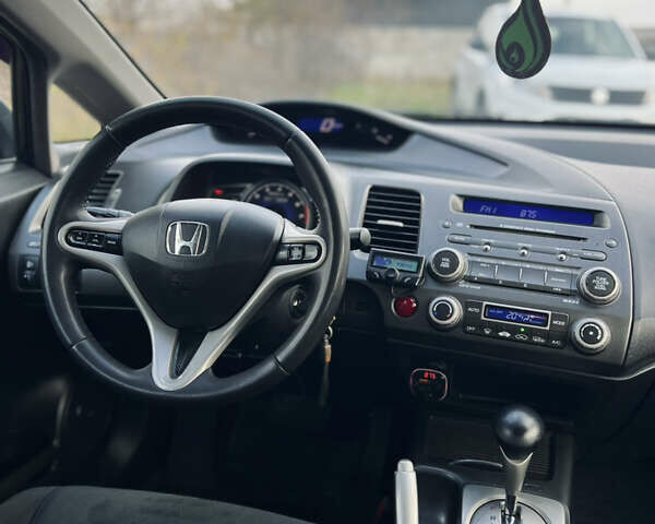 Синий Хонда Цивик, объемом двигателя 1.34 л и пробегом 191 тыс. км за 6600 $, фото 21 на Automoto.ua