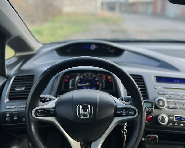 Синий Хонда Цивик, объемом двигателя 1.34 л и пробегом 191 тыс. км за 6600 $, фото 25 на Automoto.ua