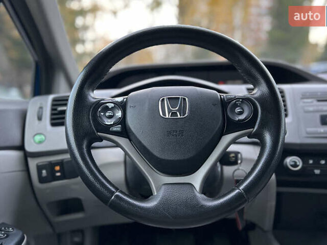 Синий Хонда Цивик, объемом двигателя 1.8 л и пробегом 219 тыс. км за 6800 $, фото 10 на Automoto.ua