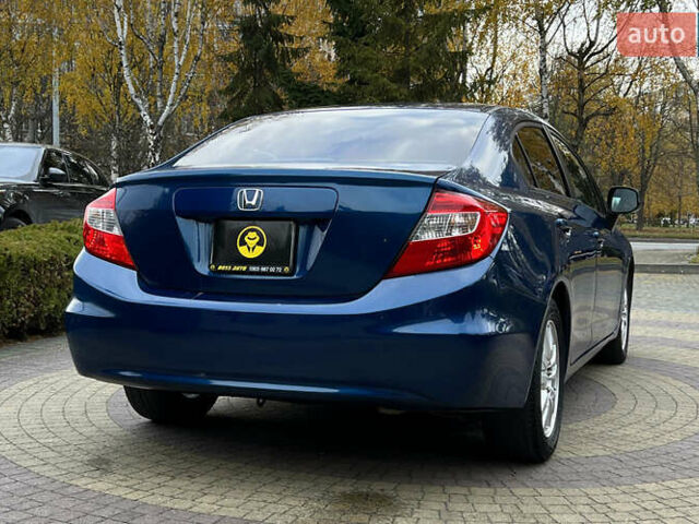 Синий Хонда Цивик, объемом двигателя 1.8 л и пробегом 219 тыс. км за 6800 $, фото 6 на Automoto.ua