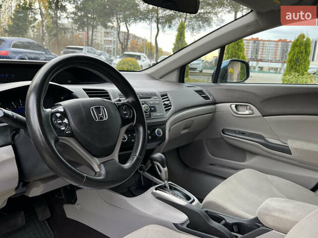 Синий Хонда Цивик, объемом двигателя 1.8 л и пробегом 219 тыс. км за 6800 $, фото 9 на Automoto.ua