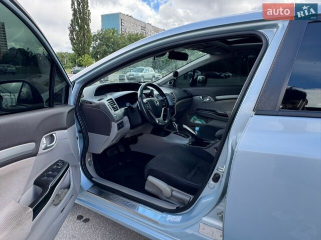 Синий Хонда Цивик, объемом двигателя 1.8 л и пробегом 230 тыс. км за 10400 $, фото 6 на Automoto.ua