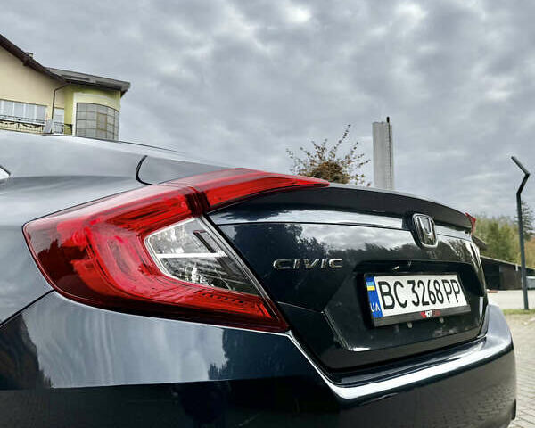 Синий Хонда Цивик, объемом двигателя 2 л и пробегом 148 тыс. км за 12700 $, фото 1 на Automoto.ua