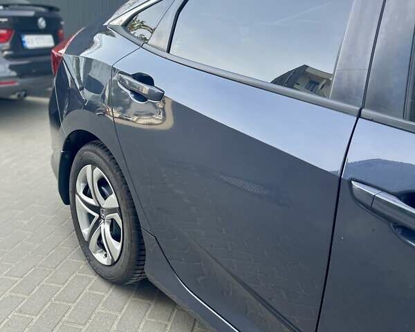 Синий Хонда Цивик, объемом двигателя 2 л и пробегом 147 тыс. км за 12700 $, фото 5 на Automoto.ua