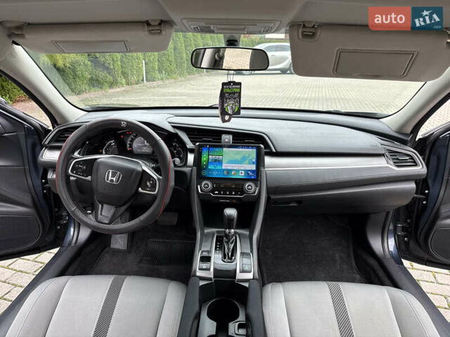 Синий Хонда Цивик, объемом двигателя 2 л и пробегом 148 тыс. км за 12700 $, фото 23 на Automoto.ua