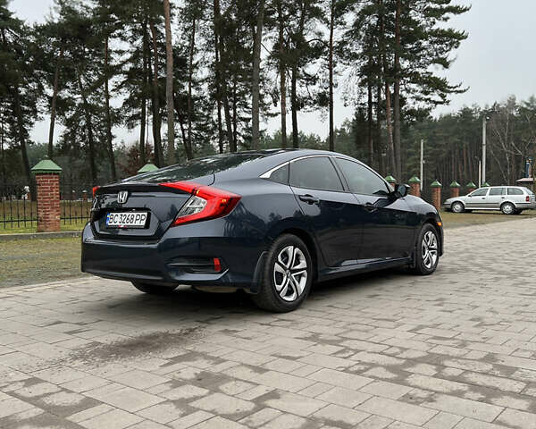 Синий Хонда Цивик, объемом двигателя 2 л и пробегом 150 тыс. км за 12600 $, фото 9 на Automoto.ua