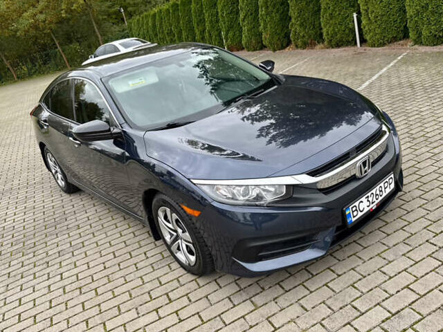 Синий Хонда Цивик, объемом двигателя 2 л и пробегом 148 тыс. км за 12700 $, фото 63 на Automoto.ua