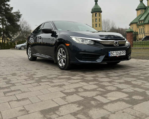 Синий Хонда Цивик, объемом двигателя 2 л и пробегом 150 тыс. км за 12600 $, фото 2 на Automoto.ua