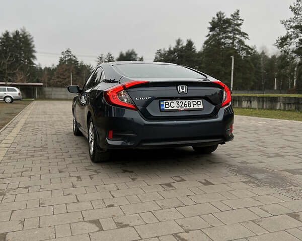 Синий Хонда Цивик, объемом двигателя 2 л и пробегом 150 тыс. км за 12600 $, фото 7 на Automoto.ua