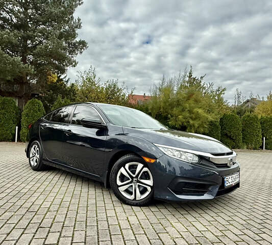 Синий Хонда Цивик, объемом двигателя 2 л и пробегом 148 тыс. км за 12700 $, фото 4 на Automoto.ua