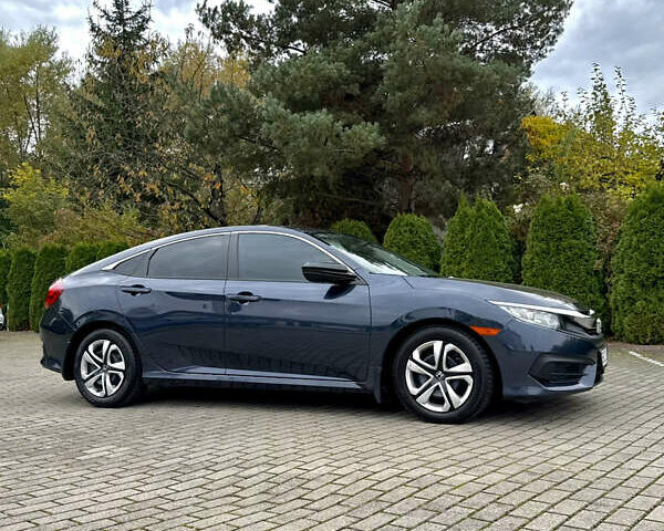 Синий Хонда Цивик, объемом двигателя 2 л и пробегом 148 тыс. км за 12700 $, фото 62 на Automoto.ua