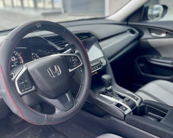 Синий Хонда Цивик, объемом двигателя 2 л и пробегом 147 тыс. км за 12700 $, фото 14 на Automoto.ua