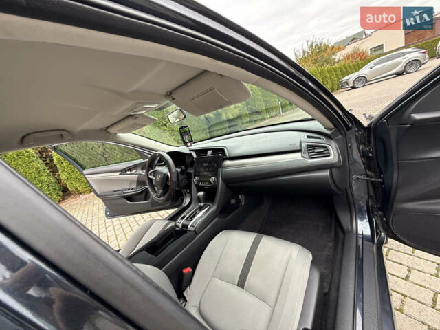 Синий Хонда Цивик, объемом двигателя 2 л и пробегом 148 тыс. км за 12700 $, фото 43 на Automoto.ua