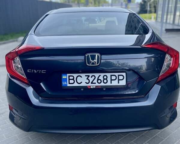 Синий Хонда Цивик, объемом двигателя 2 л и пробегом 147 тыс. км за 12700 $, фото 7 на Automoto.ua