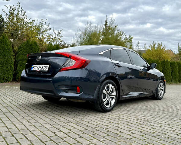 Синий Хонда Цивик, объемом двигателя 2 л и пробегом 148 тыс. км за 12700 $, фото 59 на Automoto.ua