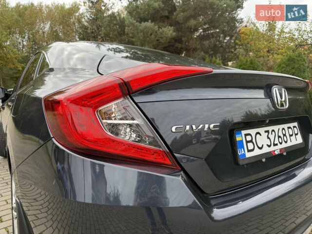 Синий Хонда Цивик, объемом двигателя 2 л и пробегом 148 тыс. км за 12700 $, фото 14 на Automoto.ua