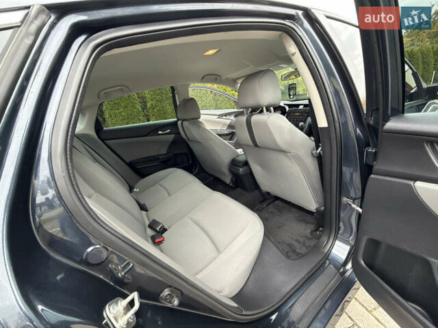 Синий Хонда Цивик, объемом двигателя 2 л и пробегом 148 тыс. км за 12700 $, фото 48 на Automoto.ua