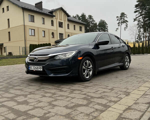 Синий Хонда Цивик, объемом двигателя 2 л и пробегом 150 тыс. км за 12600 $, фото 4 на Automoto.ua