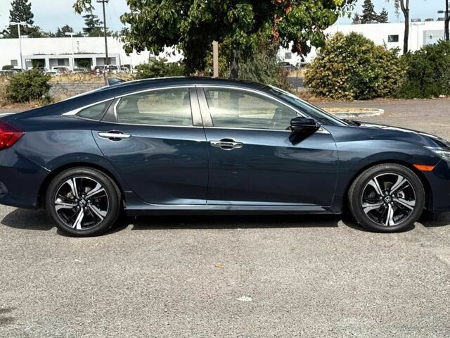 Синий Хонда Цивик, объемом двигателя 1.5 л и пробегом 44 тыс. км за 11000 $, фото 5 на Automoto.ua