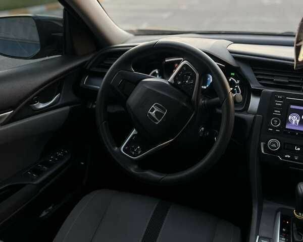 Синий Хонда Цивик, объемом двигателя 2 л и пробегом 63 тыс. км за 13000 $, фото 2 на Automoto.ua