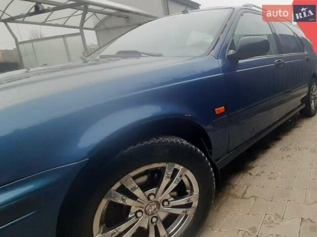 Синий Хонда Цивик, объемом двигателя 1.4 л и пробегом 318 тыс. км за 2000 $, фото 2 на Automoto.ua