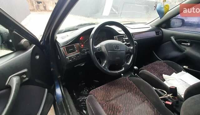 Синий Хонда Цивик, объемом двигателя 1.4 л и пробегом 318 тыс. км за 2000 $, фото 11 на Automoto.ua