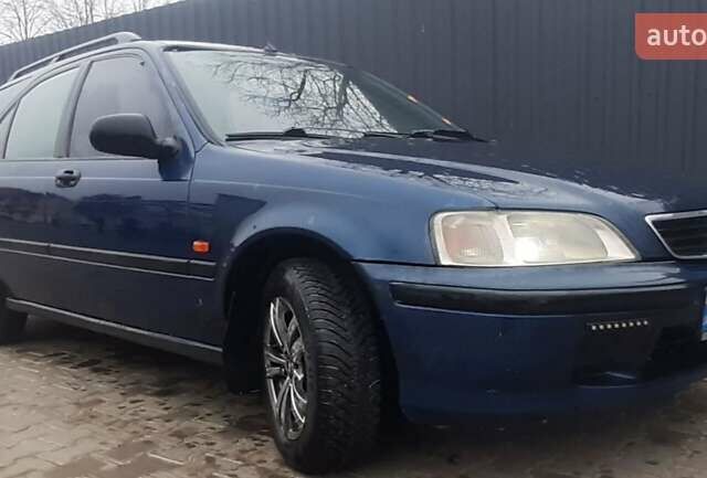 Синий Хонда Цивик, объемом двигателя 1.4 л и пробегом 318 тыс. км за 2000 $, фото 8 на Automoto.ua