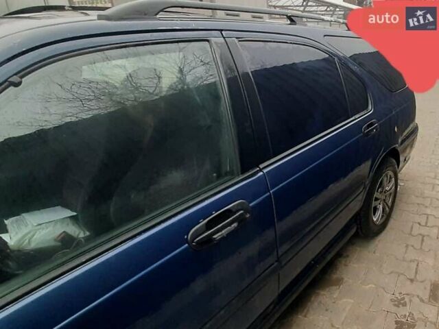 Синий Хонда Цивик, объемом двигателя 1.4 л и пробегом 318 тыс. км за 2000 $, фото 5 на Automoto.ua