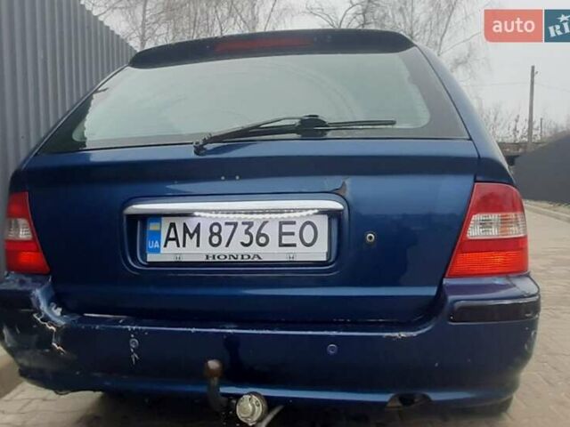 Синий Хонда Цивик, объемом двигателя 1.4 л и пробегом 318 тыс. км за 2000 $, фото 6 на Automoto.ua
