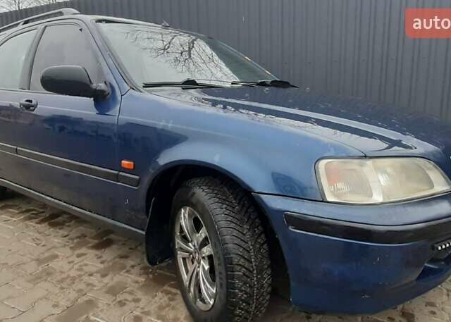 Синий Хонда Цивик, объемом двигателя 1.4 л и пробегом 318 тыс. км за 2000 $, фото 4 на Automoto.ua