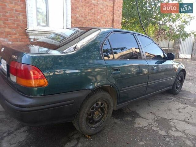 Зеленый Хонда Цивик, объемом двигателя 1.4 л и пробегом 390 тыс. км за 2600 $, фото 5 на Automoto.ua