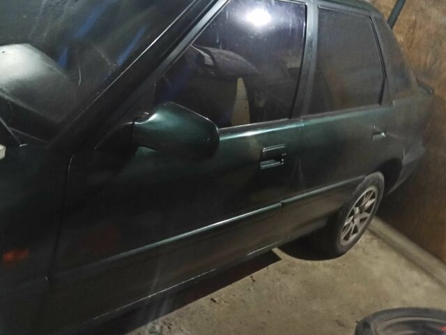 Зеленый Хонда Концерто, объемом двигателя 1.5 л и пробегом 620 тыс. км за 800 $, фото 2 на Automoto.ua