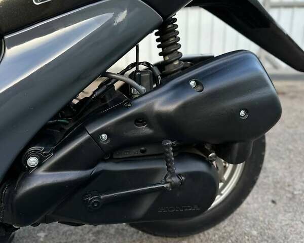 Черный Хонда Dio AF-34, объемом двигателя 0 л и пробегом 3 тыс. км за 460 $, фото 8 на Automoto.ua