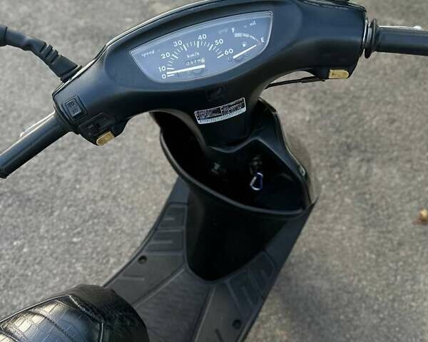 Черный Хонда Dio AF-34, объемом двигателя 0 л и пробегом 3 тыс. км за 460 $, фото 15 на Automoto.ua