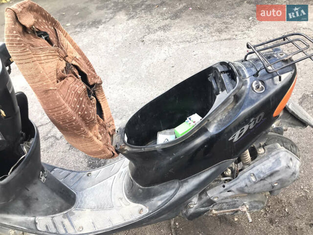 Черный Хонда Dio AF-34, объемом двигателя 0 л и пробегом 70 тыс. км за 400 $, фото 5 на Automoto.ua